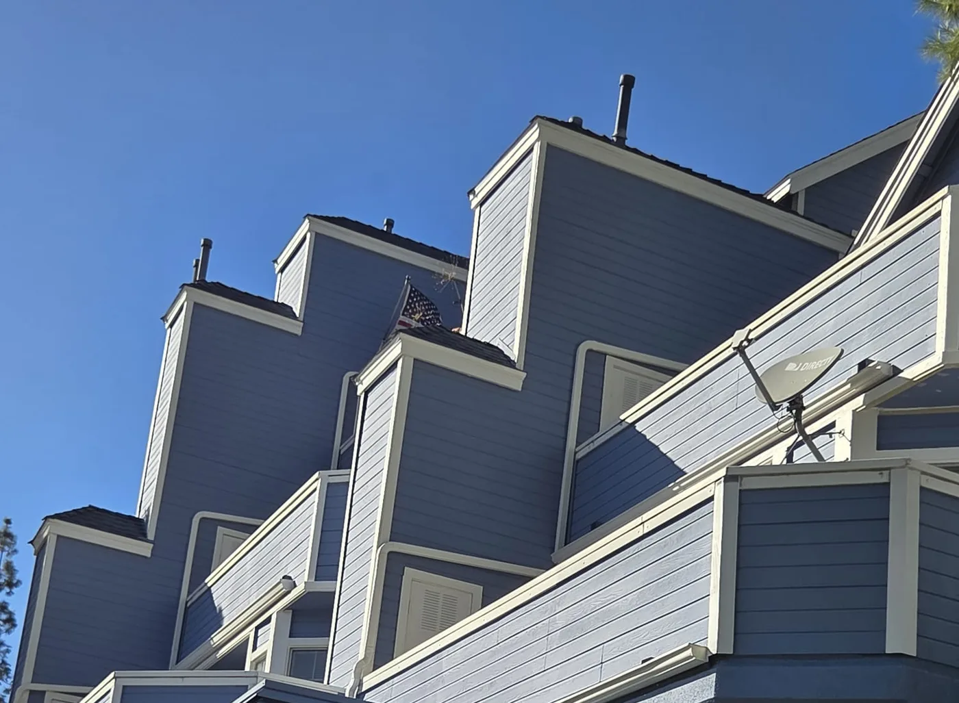 Upper balconies with fresh two-tone paint